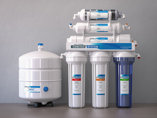 Reverse osmosis water purification system isolaterd on a kitchen table. Water cleaning system. - obrazy, fototapety, plakaty