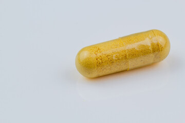 close up of herbal powder in capsule or vitamin b complex powder. 