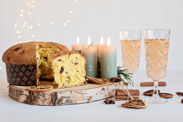 Panettone, traditional italian Christmas sweets for winter holidays celebration. Cristmas desert, festive dinner concept