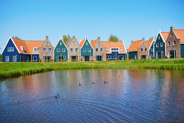 Colorful houses in marine park in Volendam