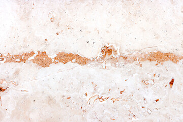 Light beige marble textured stone background. Monochrome brown grunge marbled texture.
