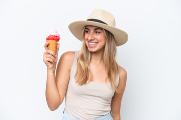 Young caucasian woman with a cornet ice cream isolated on white background with happy expression