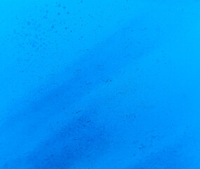 Colorful aerosol street wall background. Urban modern art texture. Wallpaper design backdrop pattern.