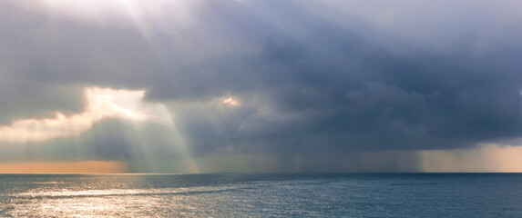 cloud of storm, pouring rain in sea, deep blue cloud speel rain water in ocean , cyclone weathre...