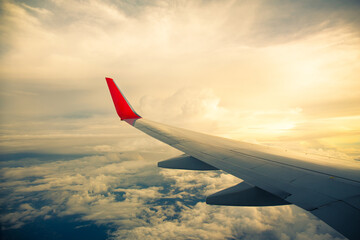 Morning sunrise with Wing of an airplane. Photo applied to tourism operators. picture for add text message or frame website. Traveling concept