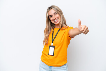 Young caucasian woman with ID card isolated on white background giving a thumbs up gesture