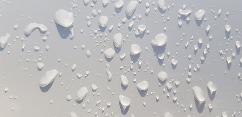 Water droplets perspective through white color surface