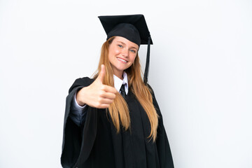 Young university graduate caucasian woman isolated on white background with thumbs up because...