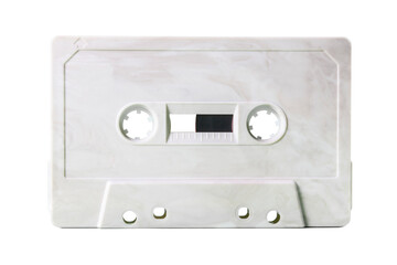 Isolated old vintage cassette tape, obsolete music tech from the 1980s. Light grey marble effect plastic body, no label.
