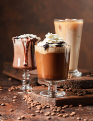 Coffee and chocolate drinks with whipped cream.