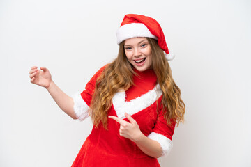 Young caucasian woman with Christmas dress isolated on white background making guitar gesture