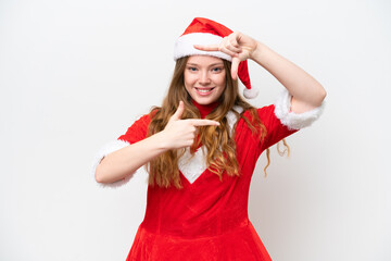 Young caucasian woman with Christmas dress isolated on white background focusing face. Framing symbol