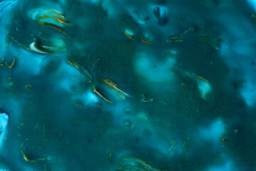 abstract creative emerald green and golden gouache background