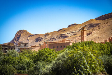Fototapeta na wymiar canyon, valley of roses, morocco, oasis, river, m'goun, high atlas mountains, north africa, mosque