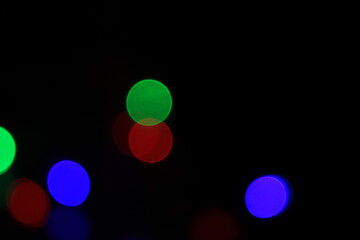 abstract blurred of blue and silver glittering shine bulbs lights background:blur of Christmas wallpaper decorations concept.xmas holiday festival backdrop:sparkle circle lit celebrations display