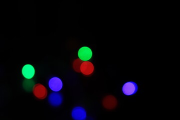 Purple Festive Christmas background. Elegant abstract background with bokeh defocused lights and stars
