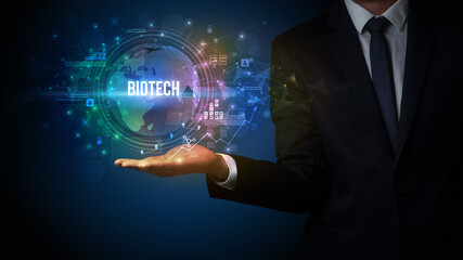 Elegant hand holding technology-related inscription