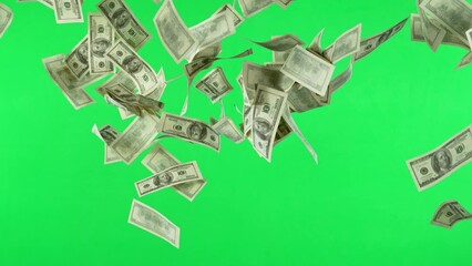 Super slow motion of flying US dollars banknotes on green background. Filmed on high speed cinema camera, 1000fps. Isolated on green screen, ready for background change.