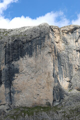 rock wall ideal for learning to climb in the Italian Alps in the summer without people