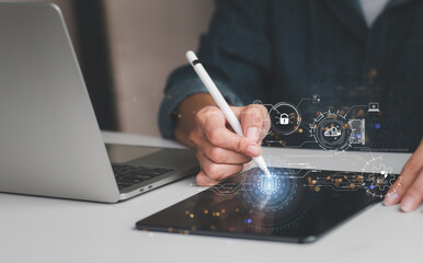 Personal data is being protected by businesswoman using digital tablet and virtual interface. Cybersecurity network The padlock icon and Internet technology networking Data privacy protection concept