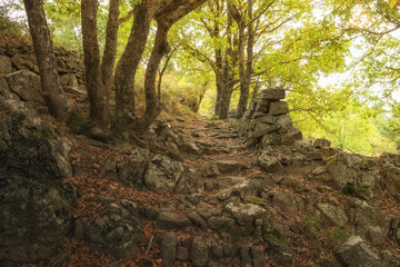 Cultural landscape in the Ardeche France at the village of Creysseilles near 07000 Privas stony path with dry masonry