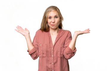 Young blonde woman over isolated background having doubts while raising hands