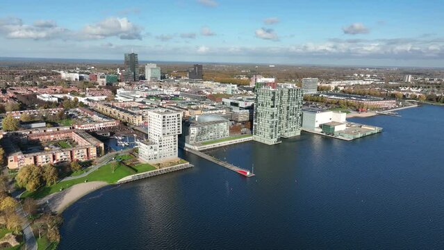 Almere medium large dutch city in province of Flevoland, The Netherlands, Skyline downtown city center, Almere Stad center, city build below sea level, Infrastructure and urban aerial view.
