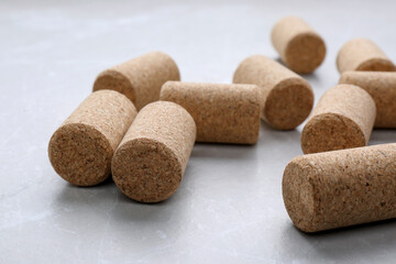 Wine bottle corks on light grey marble table, closeup