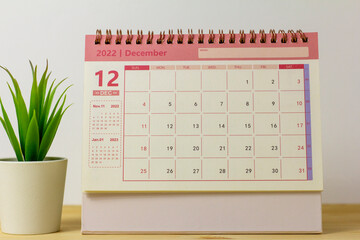 December calendar 2022 on the background of a wooden table.Planning for every day.