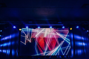 Fototapeta na wymiar concert stage lighting fixtures bright beam colored