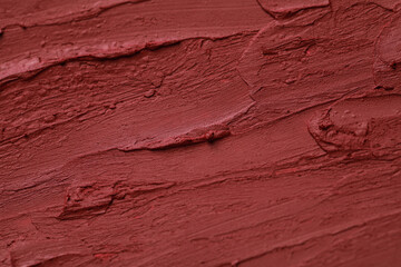 Texture of bright lipstick as background, closeup