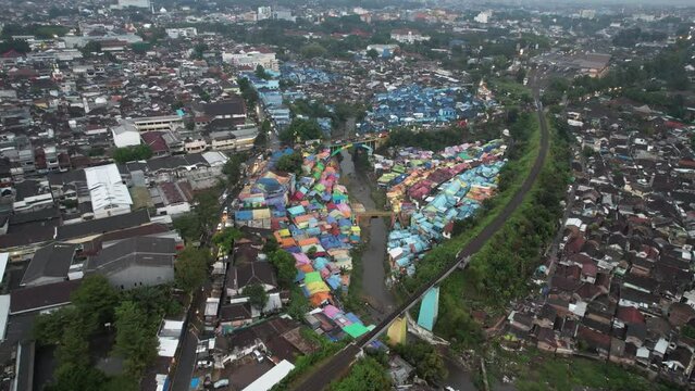 Aerial view of the old slum village Jodipan with colorful houses in Malang city. East Java, Indonesia
