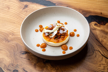 Cheescake with sea buckthorn and caramel 