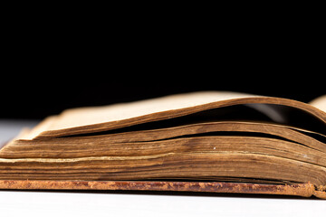 ancient book shot on black background