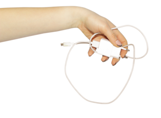 gadgets charging cable in hand , concept to pass or throw away