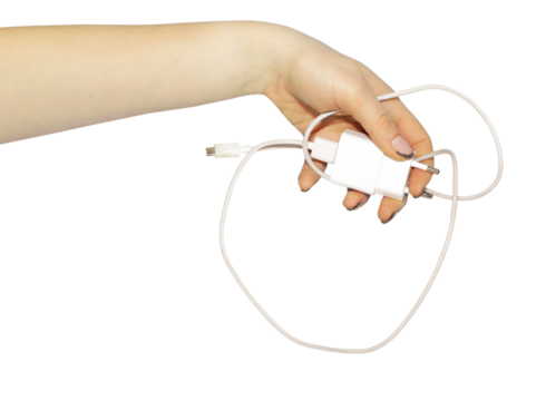 gadgets charging cable in hand , concept to pass or throw away