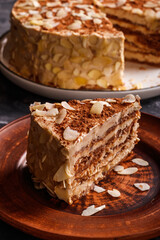 Almond cake. Piece of Cake on a Plate. Sweet food. Sweet dessert. Food background.