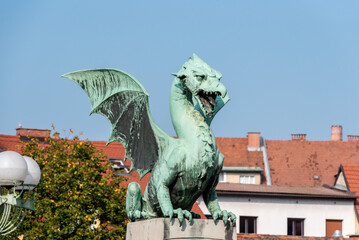 A dragon statue on the Dragon Bridge, a symbol of the city of Ljubljana, Slovenia