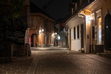 Scenic abandoned alley Trubarjeva in the city center of Ljubljana at night