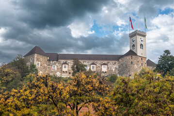 The Ljubljana city castle and golden trees in autumn