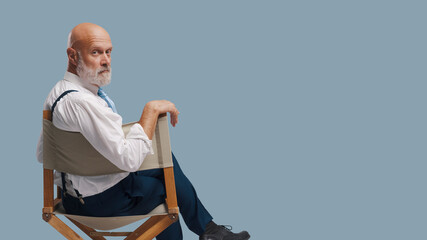 Confident filmmaker looking at camera