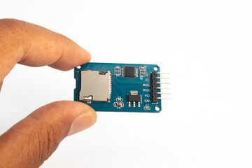 A handheld microSD card reader module. This module is used for electronics hobbyists for DIY...