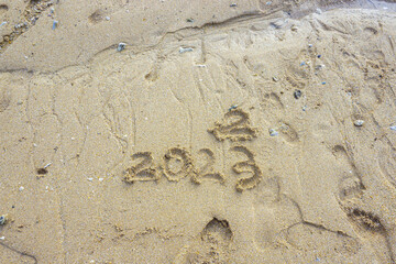 Sand writing for 2023 new year