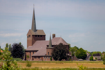 Fototapeta na wymiar Church of Our Lady of the Assumption (Onze Lieve Vrouw ten Hemelopneming kerk) Grubbenvorst is a village in the Dutch province of Limburg, The municipality of Horst aan de Maas, Venlo, Netherlands.
