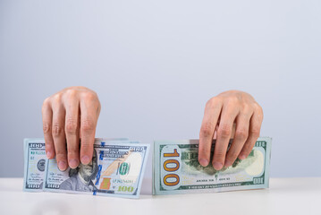 hand with U.S. dollars, finance and business, money