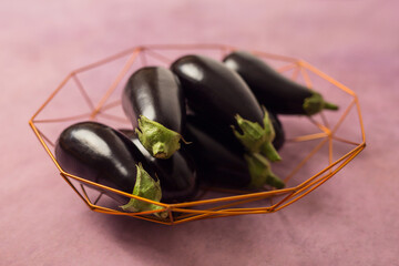 Eggplants in an iron bowl