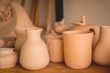 Ceramic vase on the table at the workshop