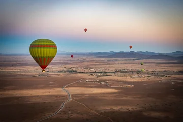 Muurstickers hot air balloon over Marrakech, morocco, north africa, sunrise, high atlas mountains, adventure © Andrea Aigner