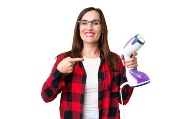 woman holding a vertical steam iron 