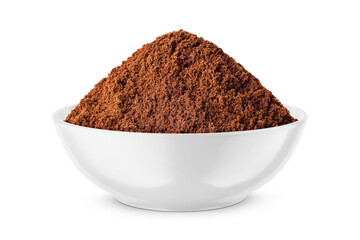 Ground coffee in round bowl isolated on white. Front view.